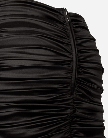 Dolce&Gabbana Short draped satin skirt with side bow Black F4CRCTFURAG