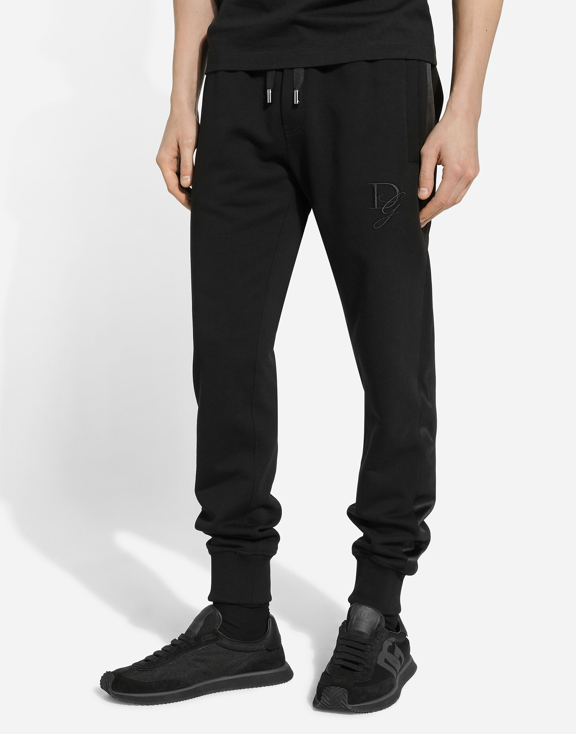 Stretch cotton jogging pants with DG embroidery in Black for Men Dolce Gabbana