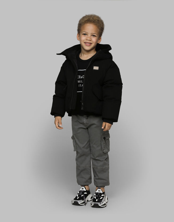 Dolce & Gabbana Pullover in lana con placca logata Nero L4KWE2JCVU9