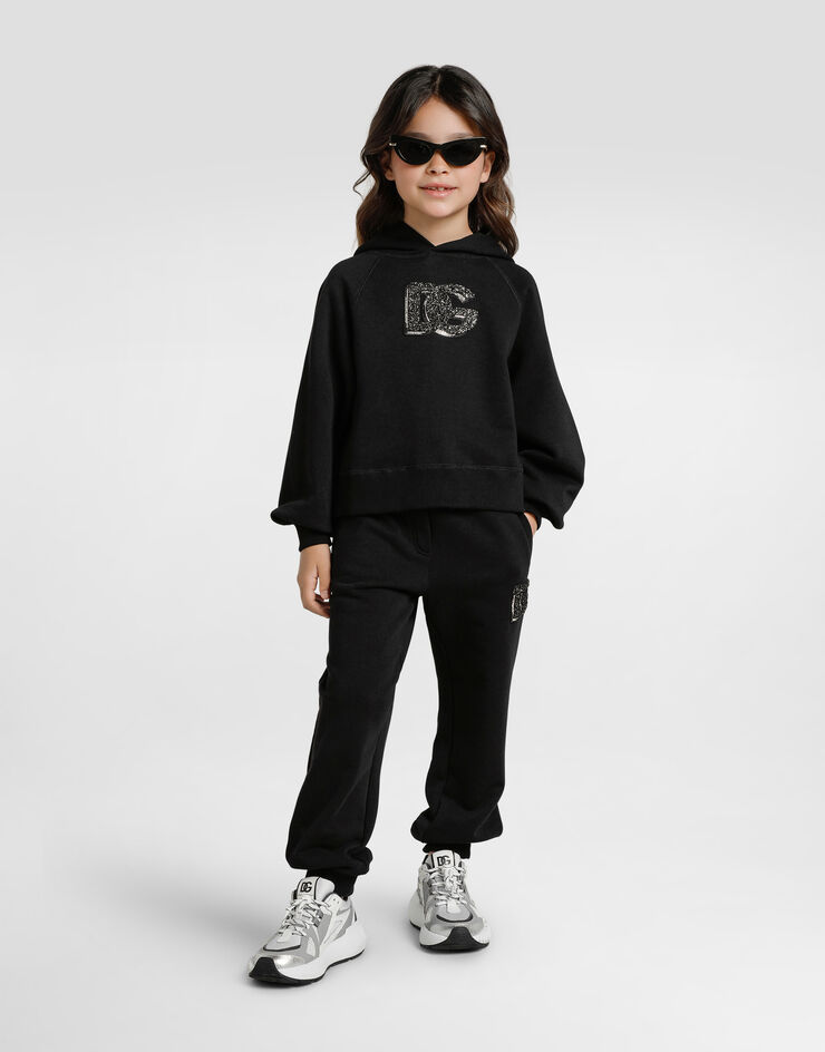 Dolce & Gabbana Oversized fleece trousers with DG logo and rhinestones Black L5JPH1G7PHM