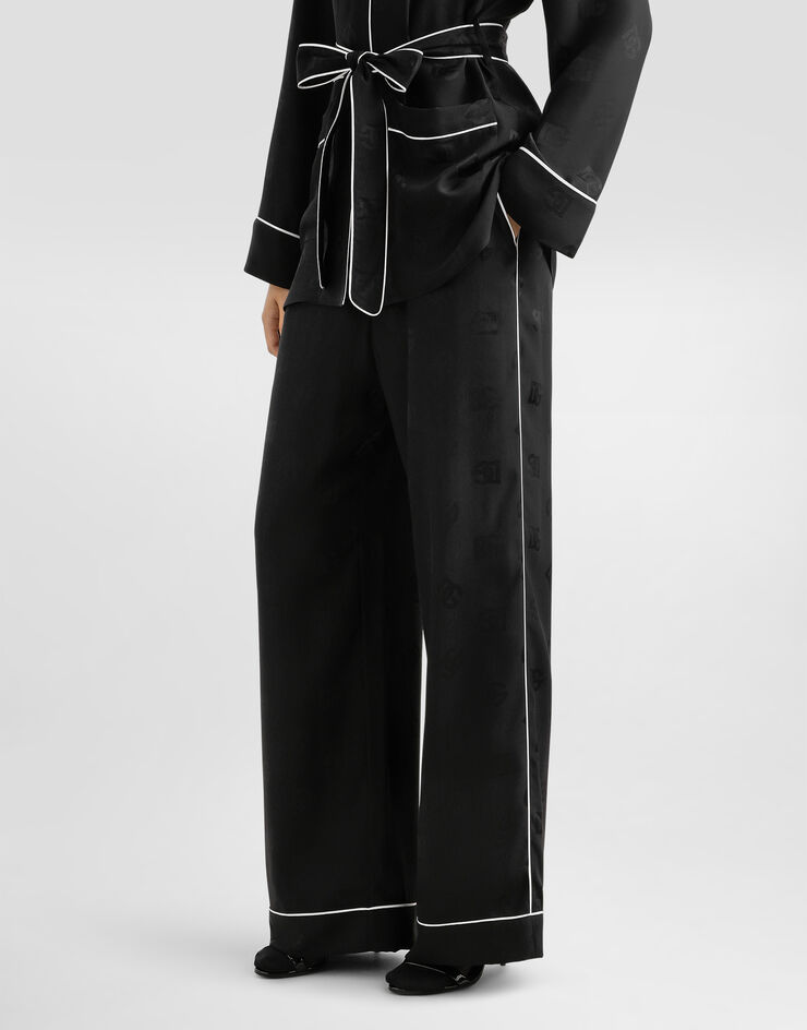 Dolce & Gabbana Pantalón de pijama en jacquard de raso de seda con motivo integral del logotipo DG Negro FTAMPTFJ1JO