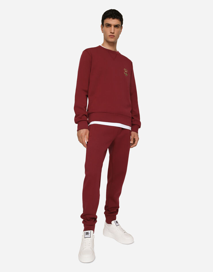 Dolce & Gabbana Pantalon de jogging en jersey à broderie Bordeaux GVF7AZHU7H9