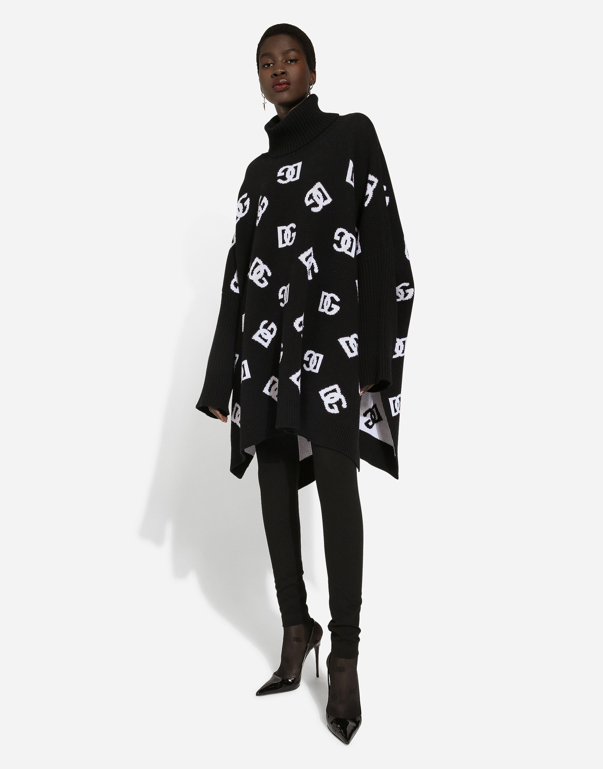 ポンチョ・ケープ DOLCE & GABBANA EMBROIDERED WOOL PONCHO Wool poncho with jacquard DG logo in Print for Women