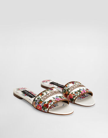 Dolce & Gabbana Nappa leather flat slippers with embroidery White CQ0571A6483