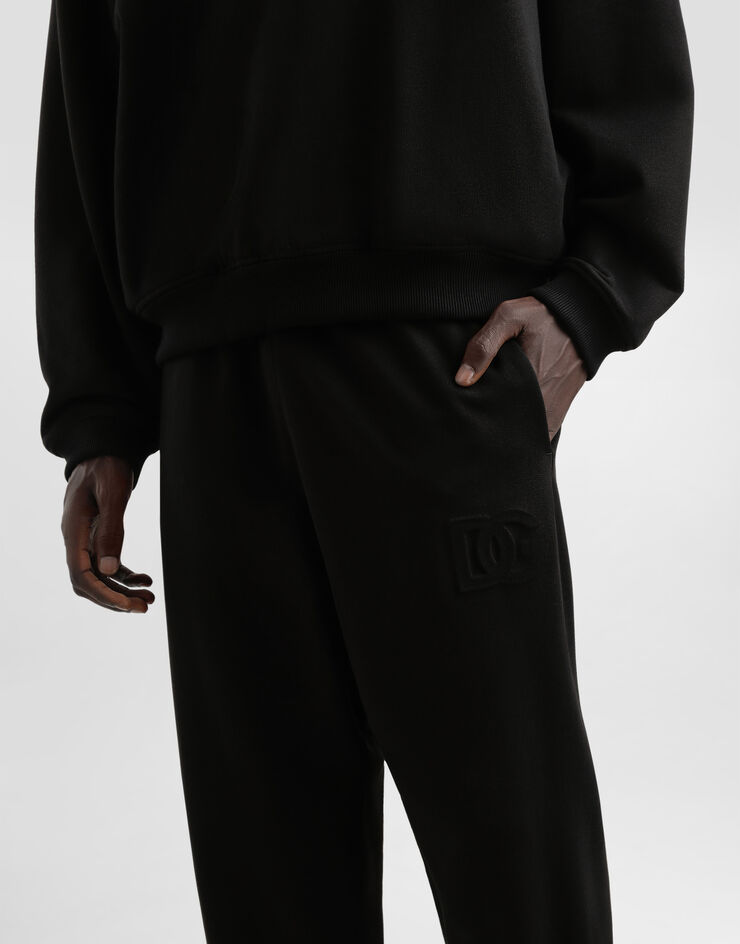Dolce & Gabbana Jogginghose aus Stretchjersey mit Stickerei Schwarz GP0G4ZG7O2S