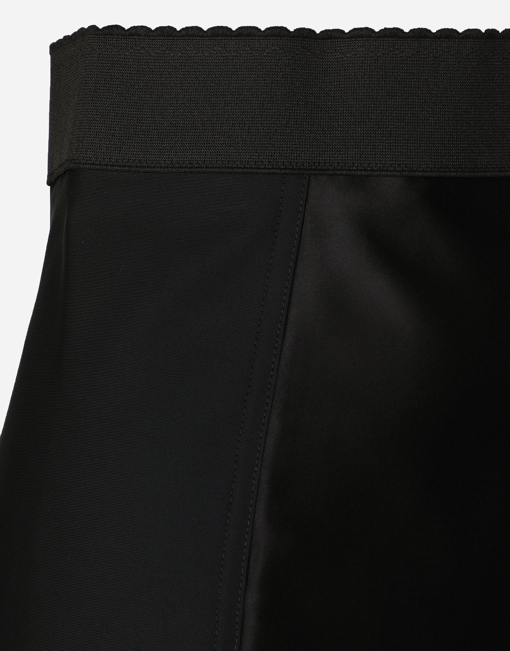 Marquisette and lace miniskirt with corset details in Black