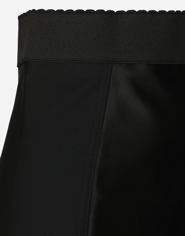 Dolce & Gabbana تنورة قصيرة دانتيل وماركيزيت مع تفاصيل الكورسيه أسود F4AMWTG9752