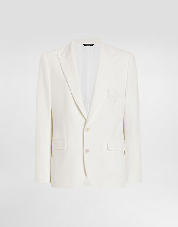 Dolce & Gabbana Einreihige Jacke aus Stretchjersey mit Logostickerei Weiss G2TJ5ZGJ070