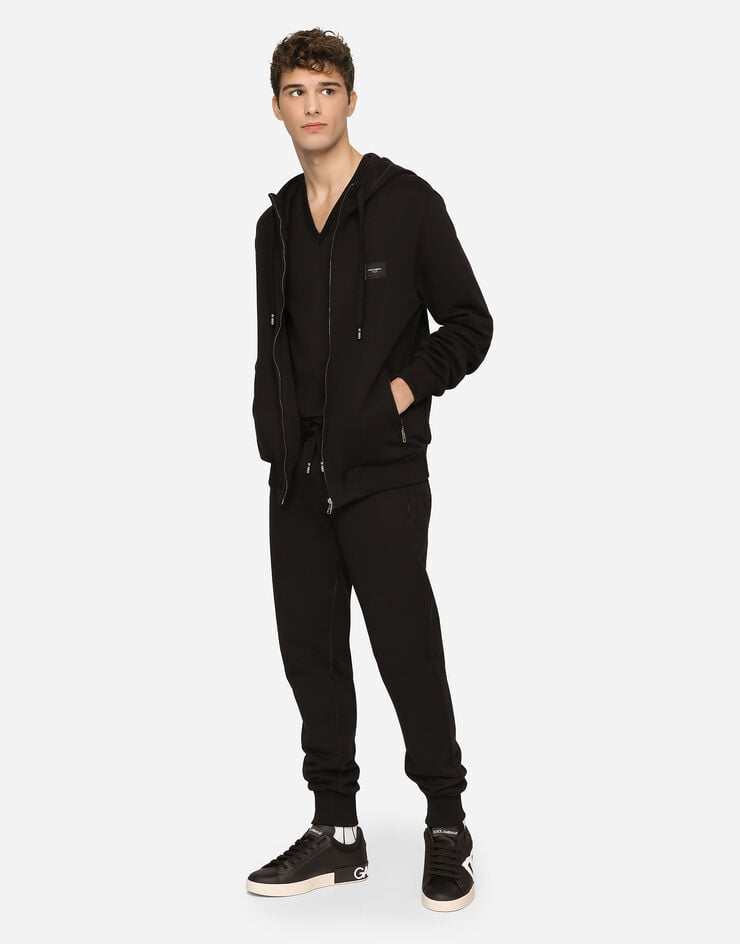 Dolce & Gabbana Sweat-shirt en jersey à capuche et fermeture zippée Noir G9PD2TFU7DU