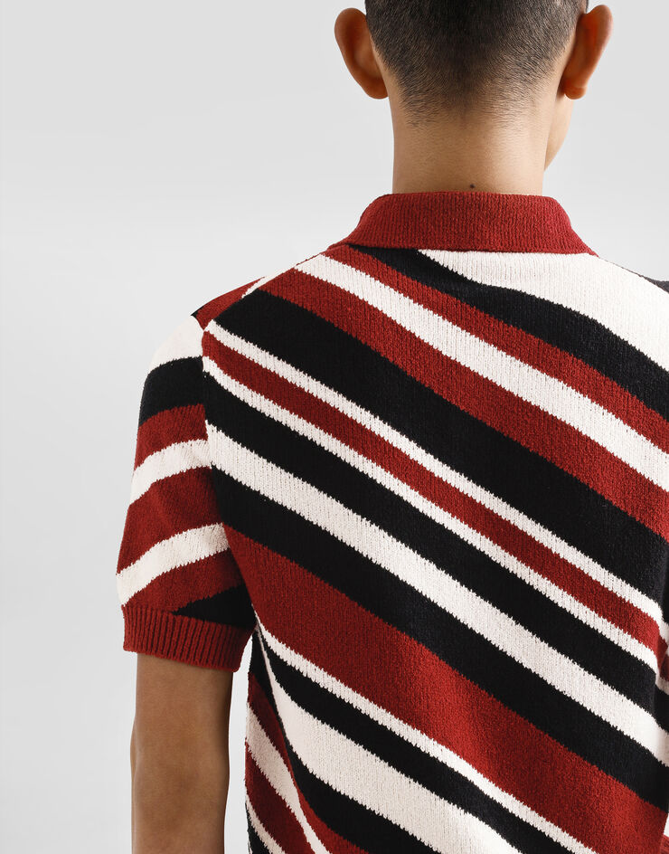 Dolce & Gabbana Jersey polo de algodón de manga corta con intarsia a rayas Multicolor GXZ64TJFMMS