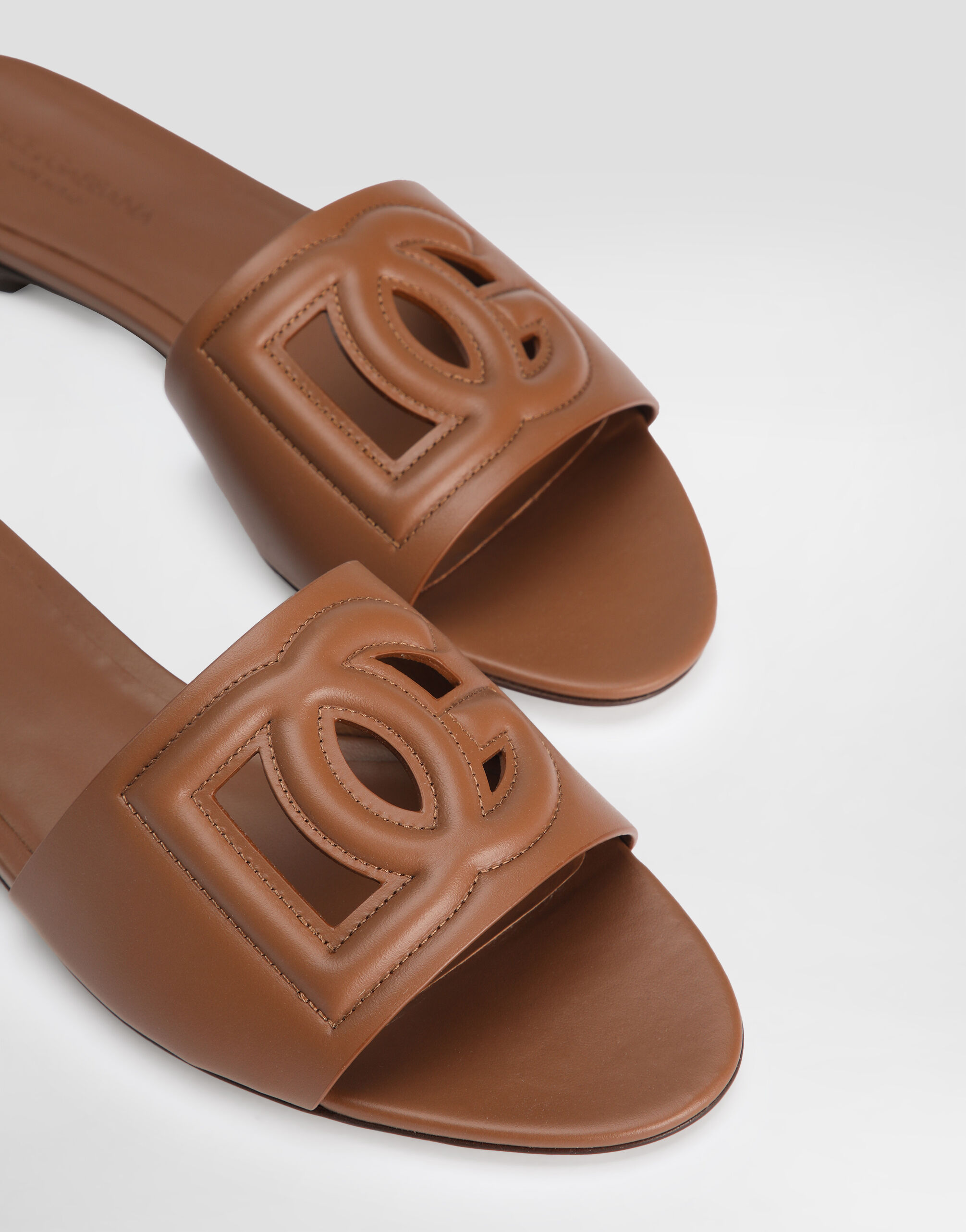 Calfskin sliders with DG logo in Brown for Women