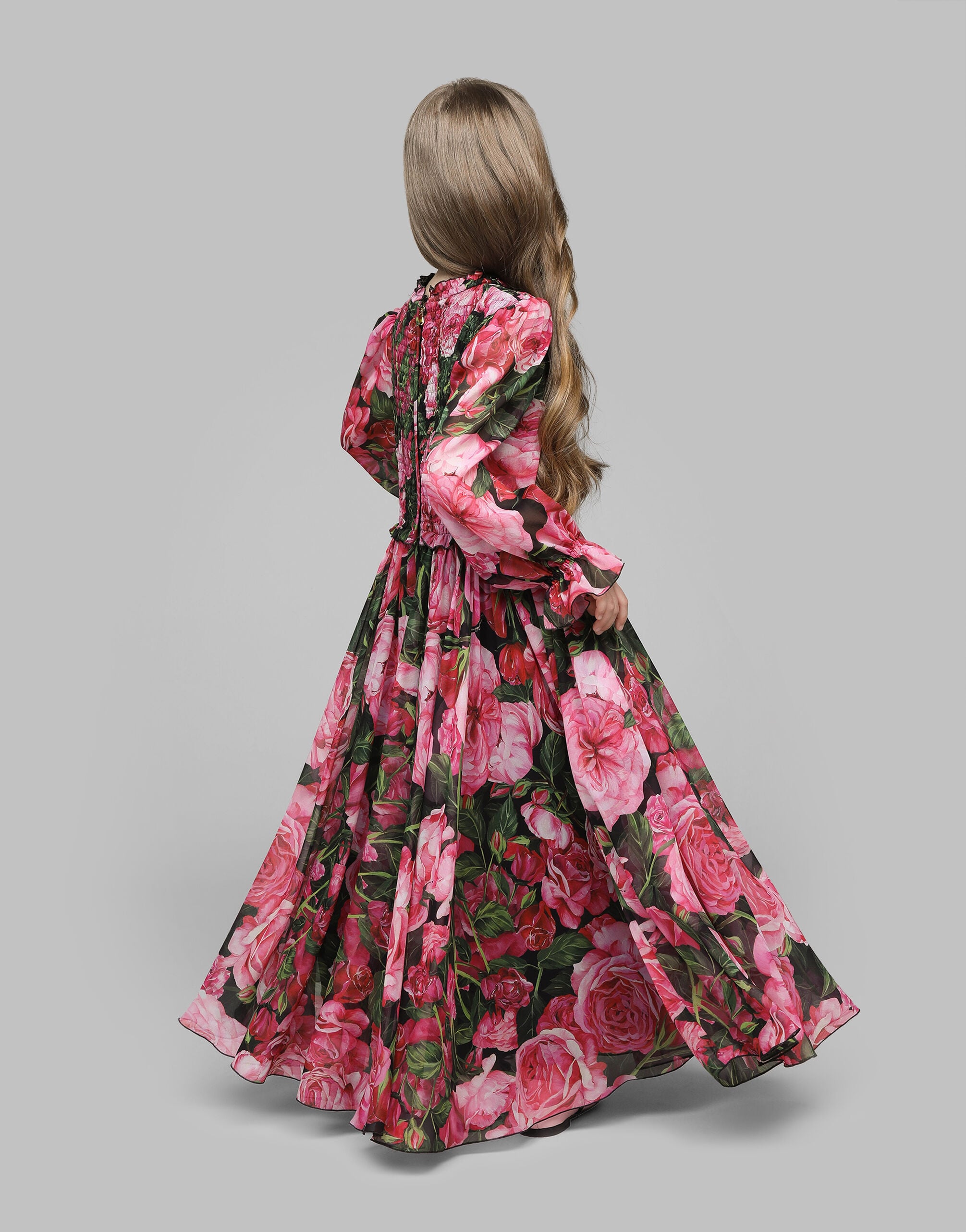 Georgette dress with rose print over a black background in Print