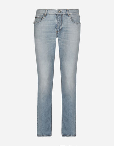 Dolce & Gabbana Regular fit washed stretch denim jeans with abrasions Multicolor GY07LDG8HG2