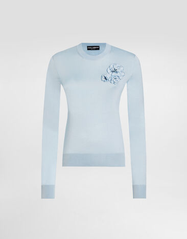 Dolce & Gabbana Jersey de seda con broche de flor Azul Claro FXX48ZJBSO1