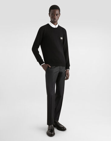 Dolce & Gabbana Wool round-neck sweater with branded tag Black GXO39TJGMG9