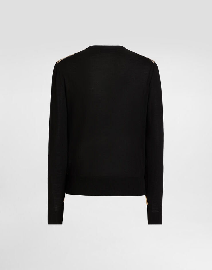 Dolce & Gabbana Pullover en laine à imprimé léopard Print FXX31TJGMGS