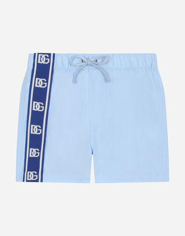 Dolce & Gabbana Nylon swim trunks with DG logo band Azure L1J837G7D7W