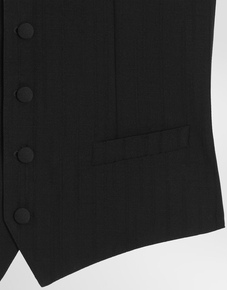 Dolce & Gabbana Chaleco de botonadura simple en jacquard de lana con motivo de rayas Negro G702UTFR22A