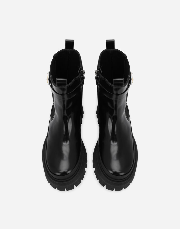 Dolce & Gabbana Calfskin boots with logo tag Black D11137A1671