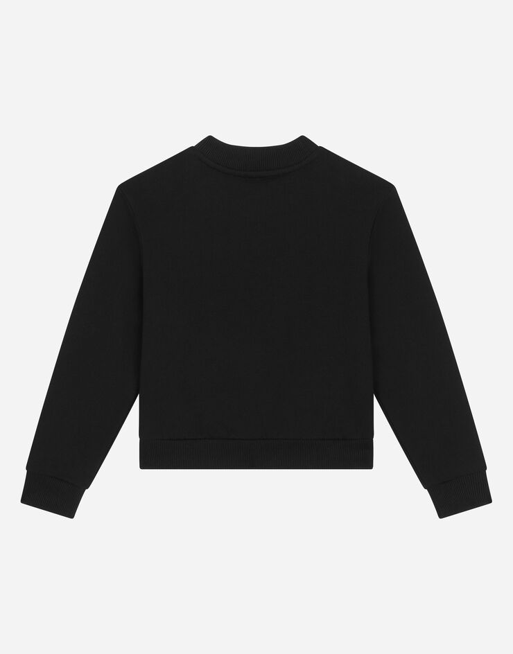 Dolce&Gabbana Sweat-shirt ras de cou en jersey avec imprimé floqué Noir L4JWHZG7K2C