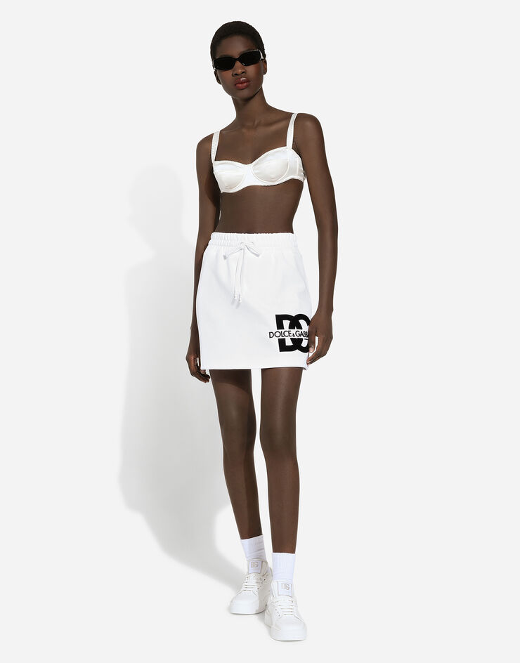 Dolce & Gabbana Minigonna in jersey con patch logo DG Bianco F4CSKZGDB7B