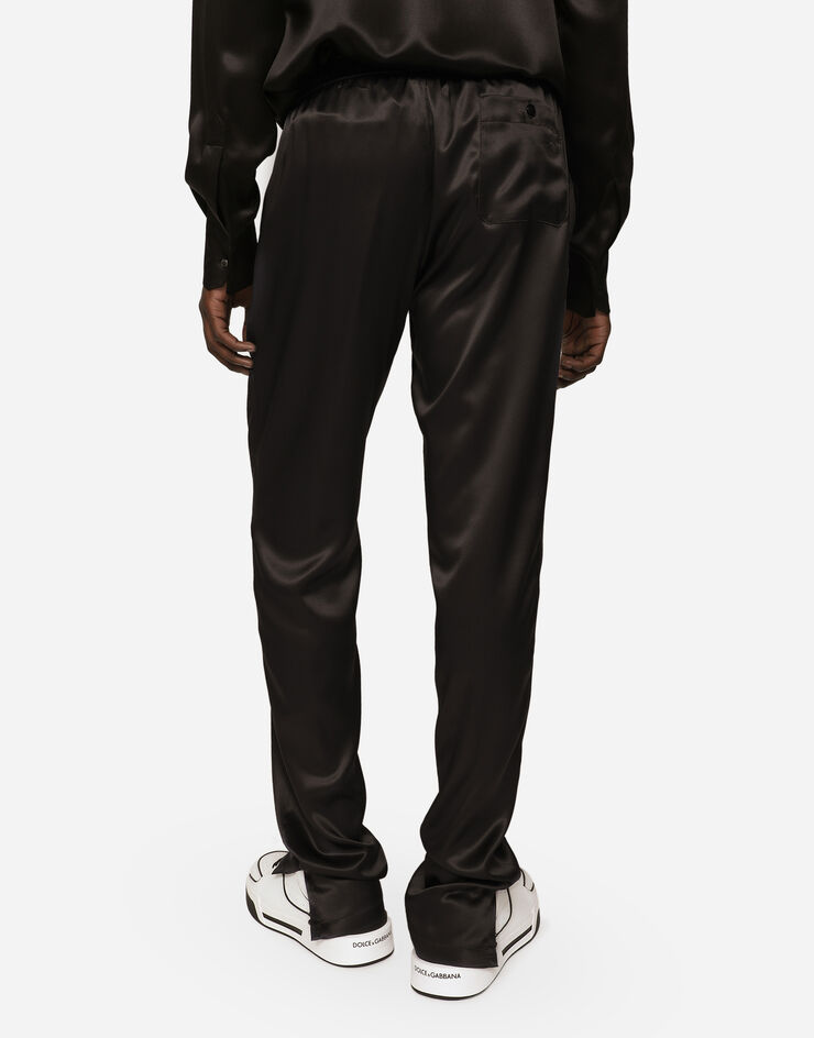 Dolce&Gabbana Silk satin jogging pants with metal DG logo Black I4182MFU1AU