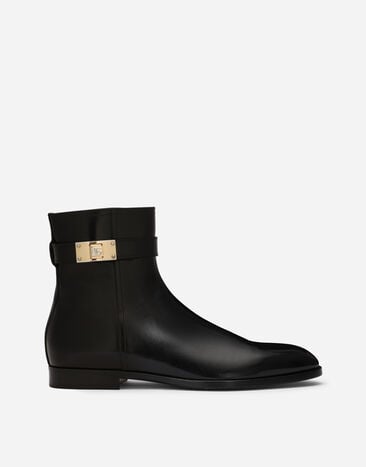 Dolce & Gabbana حذاء بوت برقبة للكاحل من جلد عجل مصقول أسود A60590AT397