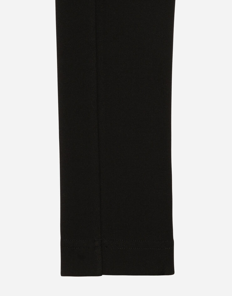 Dolce & Gabbana Oberteil aus Viskose mit Armstulpen Schwarz F772NTFURL6