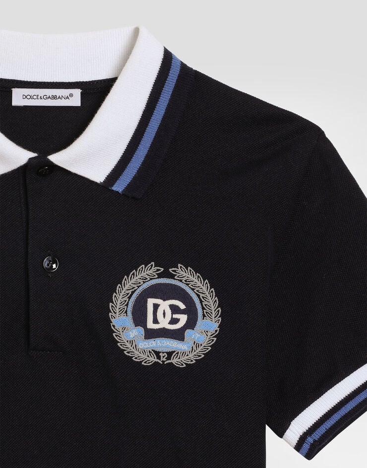 Dolce & Gabbana Piqué polo shirt with Dolce&Gabbana embroidery Blue L4JTGWG7PDD