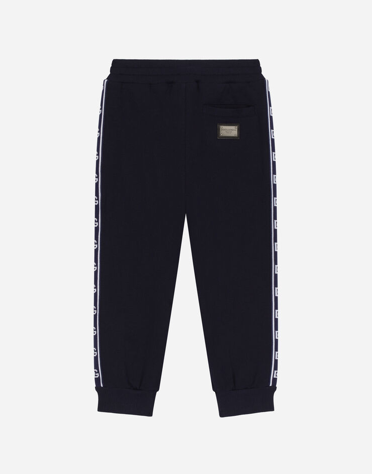 DolceGabbanaSpa Cotton jogging pants with branded side bands Blue L4JPIIG7JT7