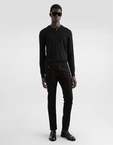 Dolce & Gabbana Jersey de cuello redondo de cachemira con detalle joya Negro GXX02ZJBW05