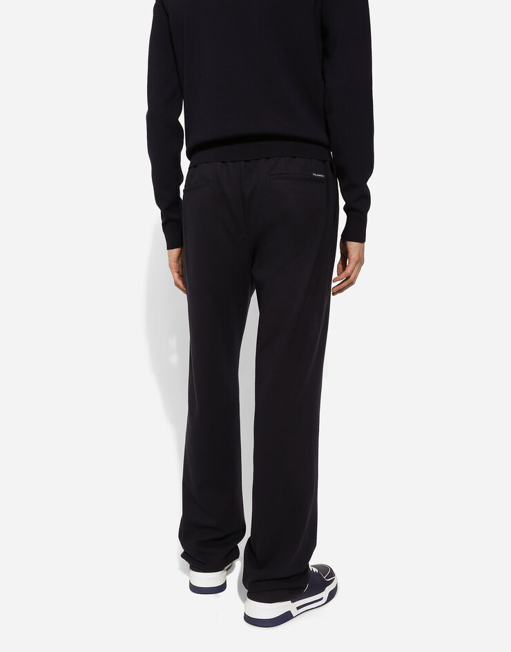 Dolce & Gabbana Pantalón de chándal en punto elástico Azul GP03ATFUGLI