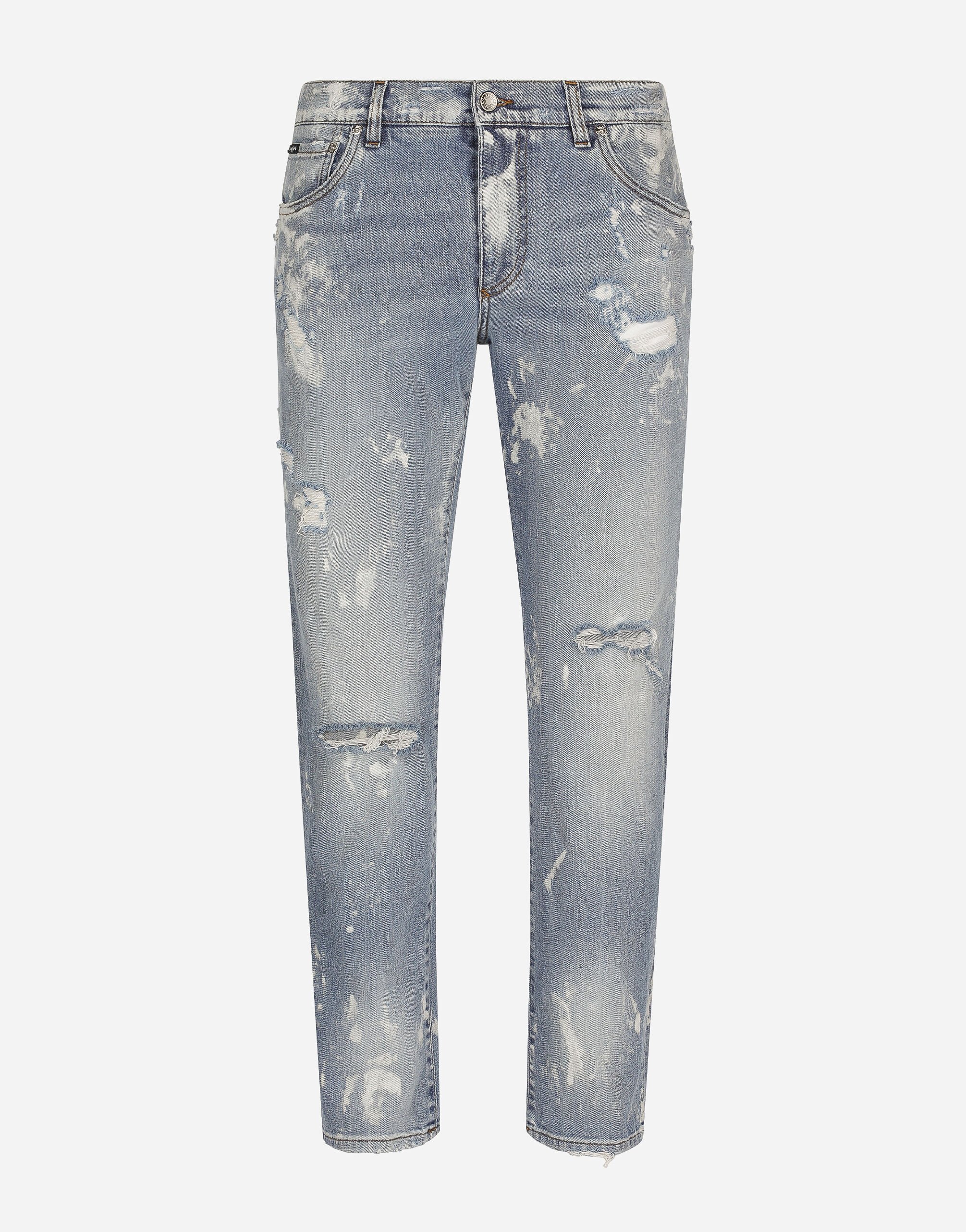 Dolce & Gabbana Jeans Slim aus Stretchdenim gebleicht gewaschen Drucken BM2274AR700