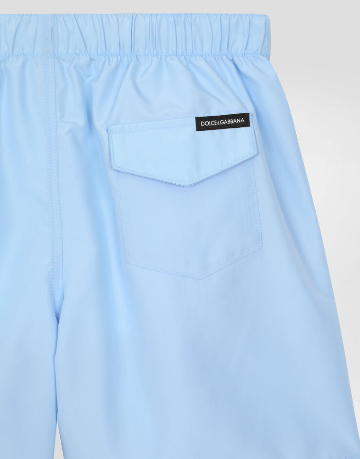 Dolce & Gabbana Swim trunks with logo Azure L4J818ON01H