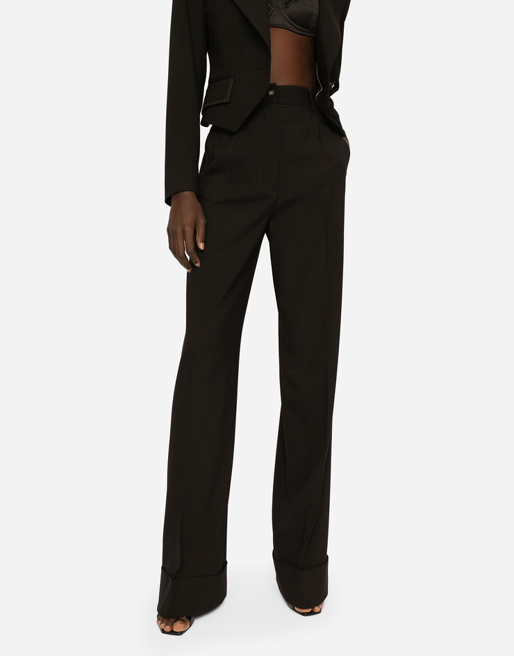 Dolce & Gabbana Pantalones palazzo en tela de lana con dobladillo Negro FTBM0TFUBAJ