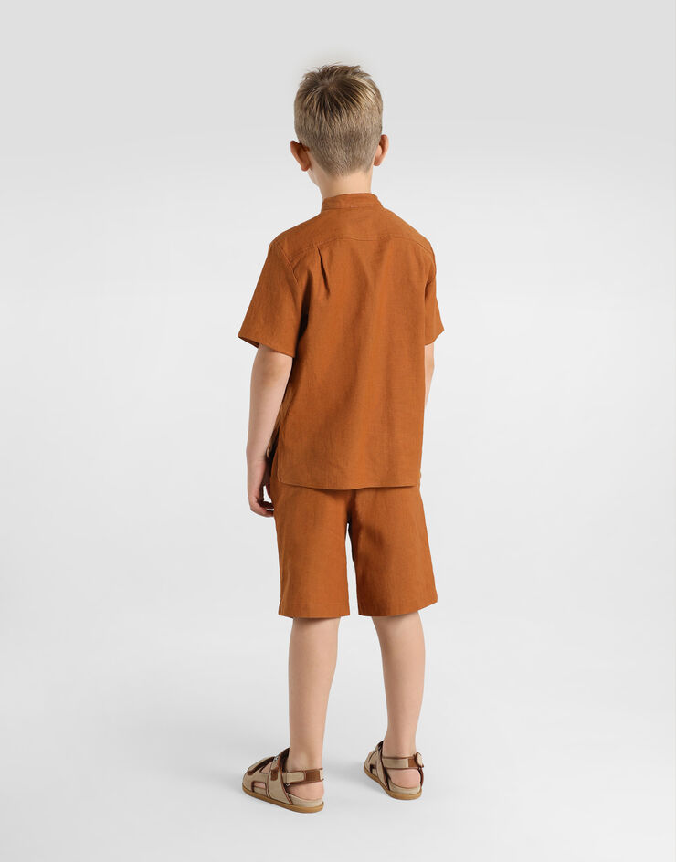 Dolce & Gabbana Cotton and linen canvas bermuda shorts Beige L43Q58LT372