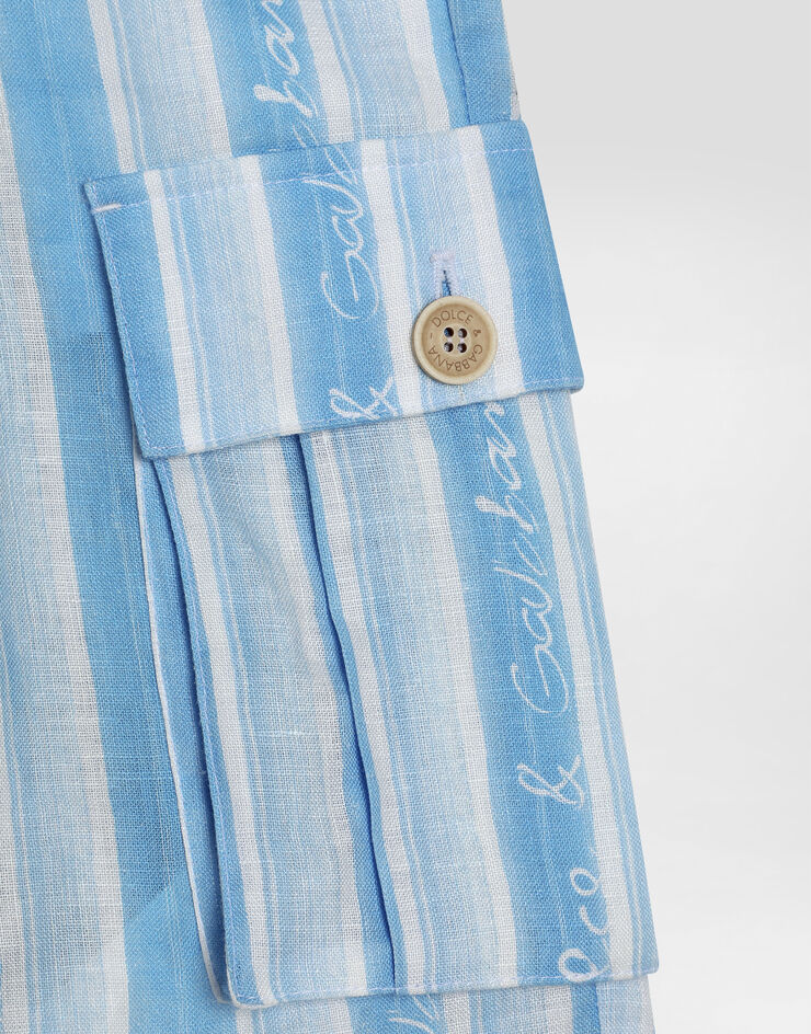 Dolce & Gabbana شورت كارغو من قماش كانفاس بطبعة مخططة أزرق L43Q64FS4HU