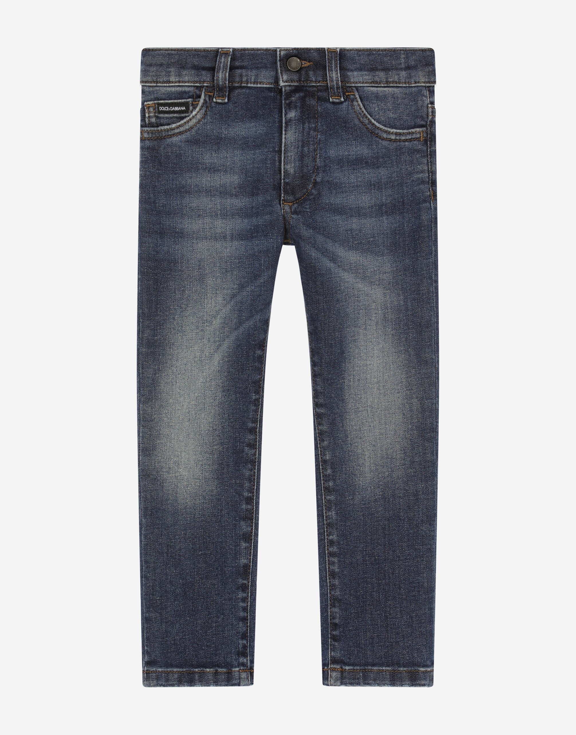 Dolce & Gabbana Jeans Slim aus gewaschenem blauem Stretchdenim Drucken L4JQS3HS7NJ