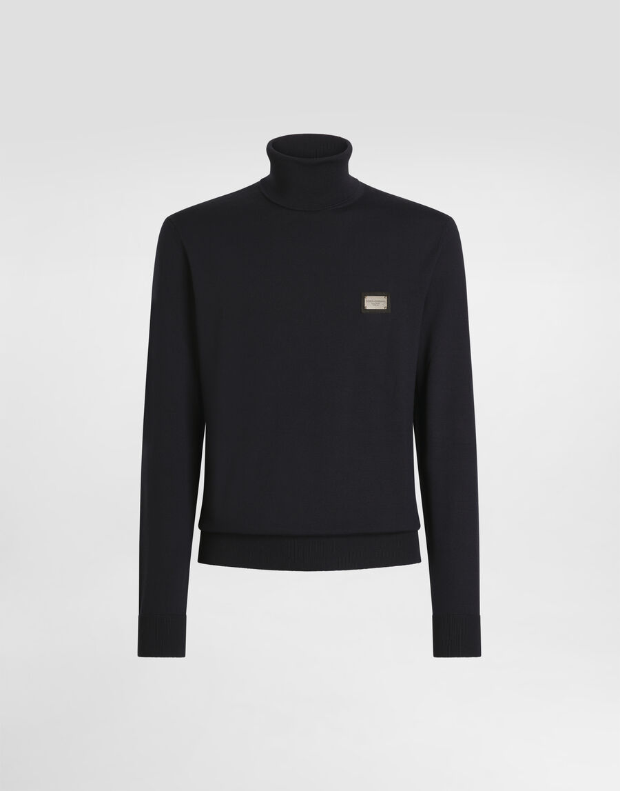 Wool turtle-neck sweater with branded tag