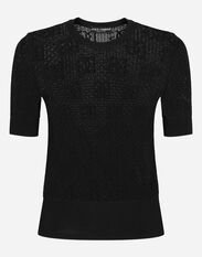 Dolce & Gabbana Short-sleeved lace-stitch sweater with DG logo Green FXZ01ZJBSHY