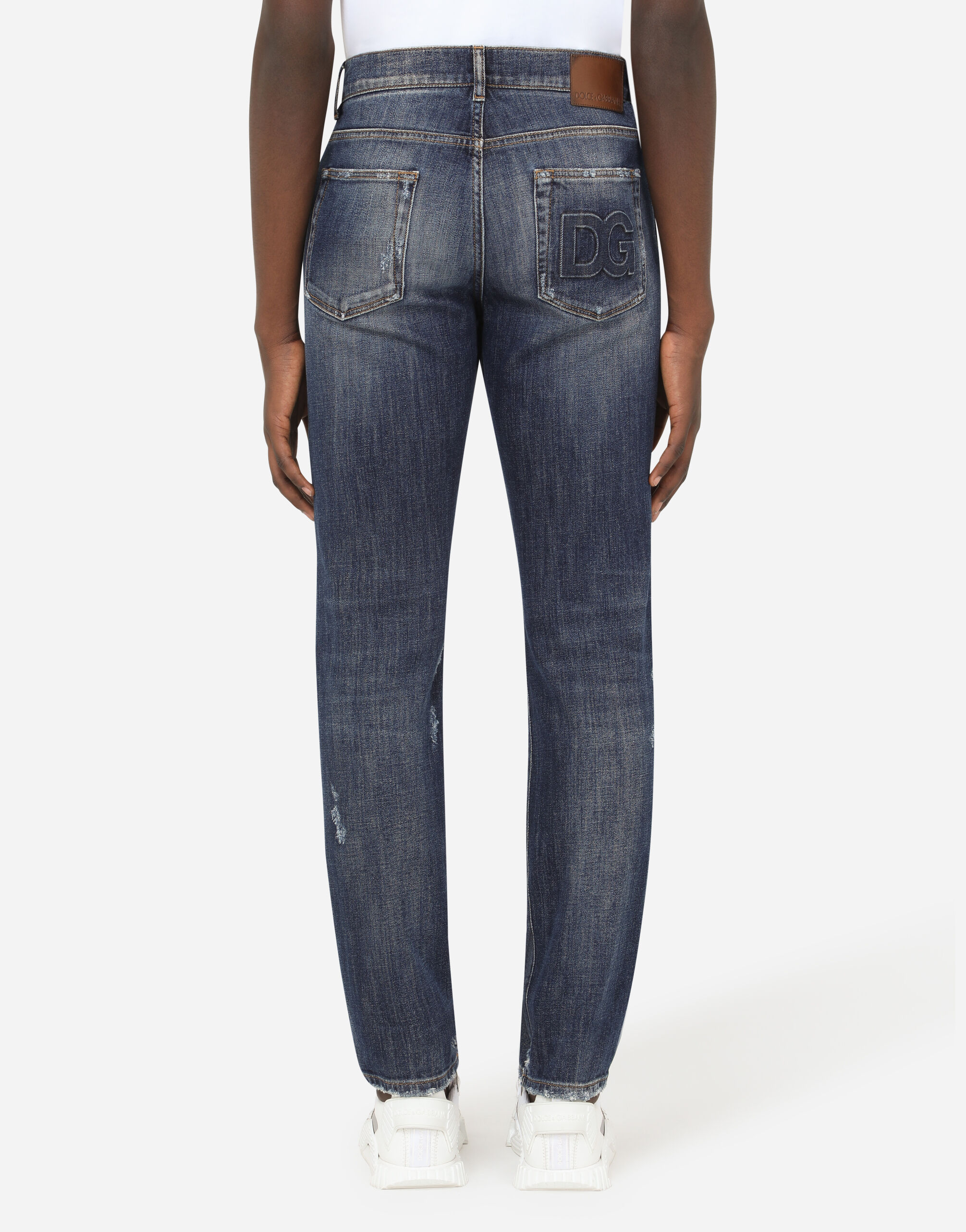 Washed blue slim-fit stretch jeans with DG logo
