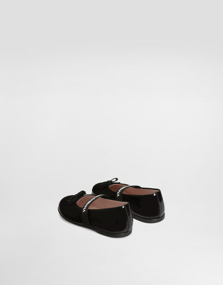 Dolce & Gabbana Ballerines en cuir verni avec nœud Noir D20093A4831