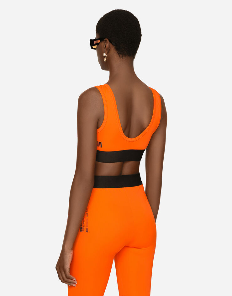 Dolce & Gabbana Bralette-Top aus maschenfestem Jersey mit Print DGVIB3:<br>• Orange<br>• Gerader Ausschnitt<br>• Enge Passform<br>• Ungefüttert<br>• Der Artikel hat bei Größe 40 IT eine Länge von 9 cm ab der hinteren Mitte<br>• Das Model ist 175 cm groß und trägt Größe 40 IT<br>• Made in Italy DGVIB3 Orange F79BWTG7K6V