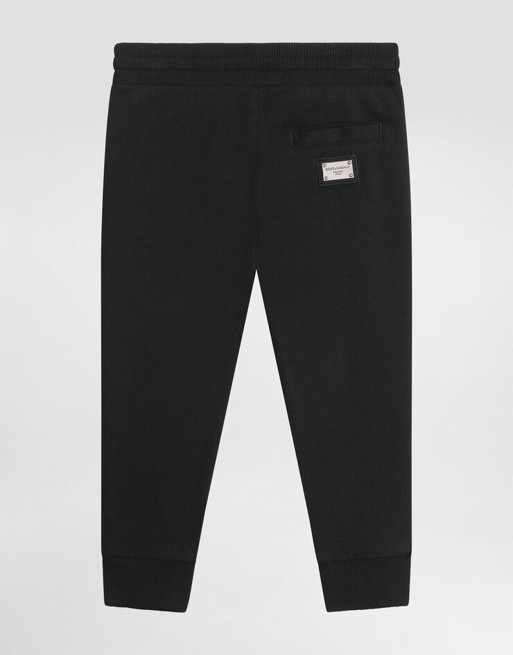 DolceGabbanaSpa Fleece trousers with DG logo plaque Black L4JPT0G7I2P