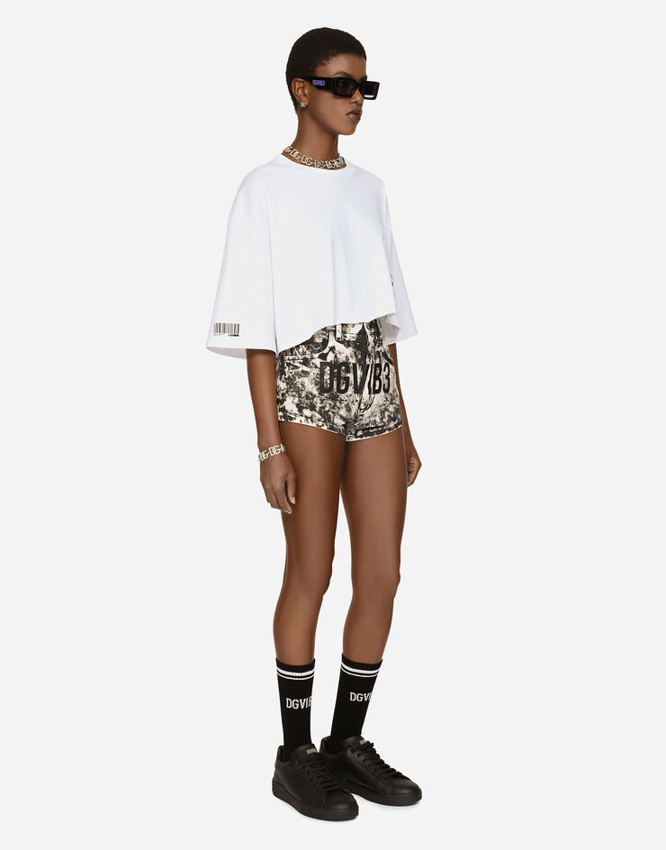 Dolce & Gabbana Shorts en denim de algodón con tratamiento lavado DGVIB3 Multicolor FTC24DG8KP4