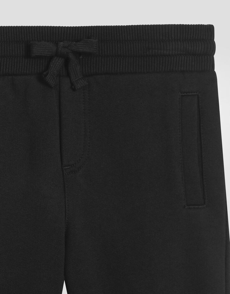 DolceGabbanaSpa Fleece trousers with DG logo plaque Black L4JPT0G7I2P