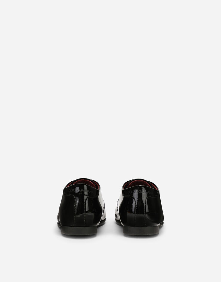 Dolce & Gabbana Derbys en cuir verni à logo Noir DL0029A1328