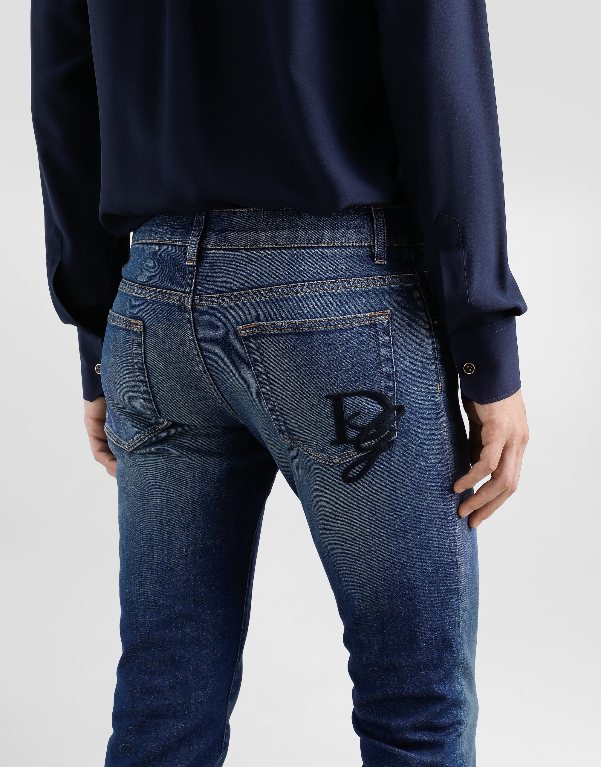 Skinny stretch cotton jeans with logo embroidery in