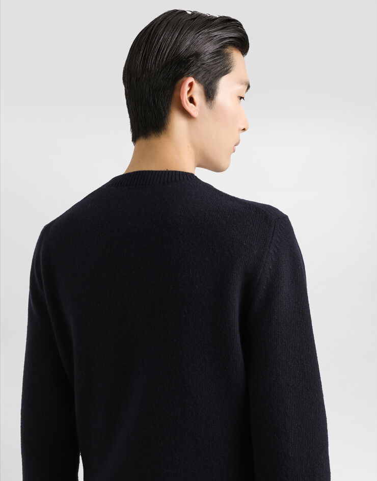 Dolce & Gabbana Wool round-neck sweater with bejeweled buttons Blue GXX91ZJCVWR