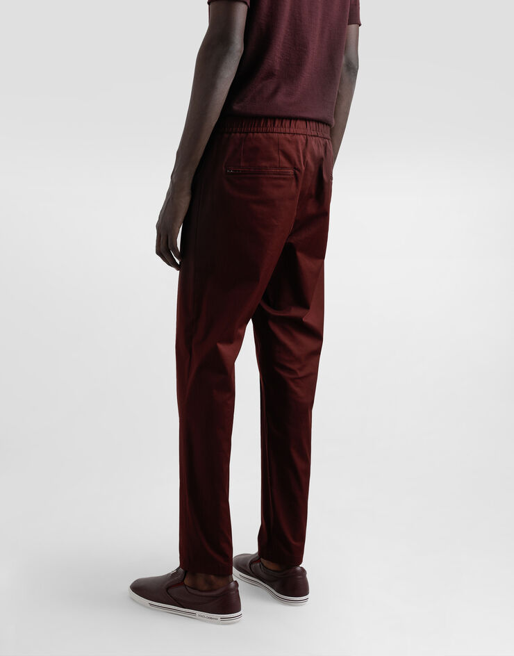 Dolce & Gabbana Jogginghose aus Baumwolle mit Plakette Mehrfarbig GYACETFUFNV